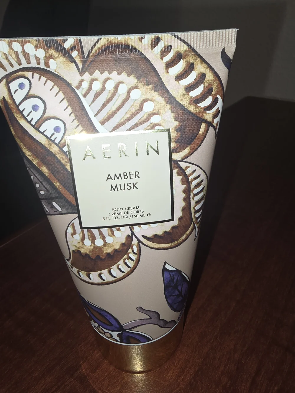 Aerin Amber Musk Body Cream — Beige Tube with Gold and Navy Accents